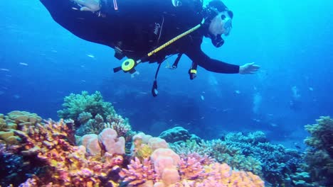 Scuba-diver-filming-underwater-life