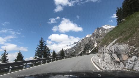 Climbing-a-Mountain-road-in-a-car-in-Tirol,-Austria