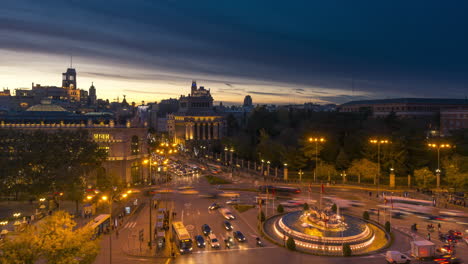 Timelapse-of-Madrid-at-sunset,-Cibeles-square-as-main-subject
