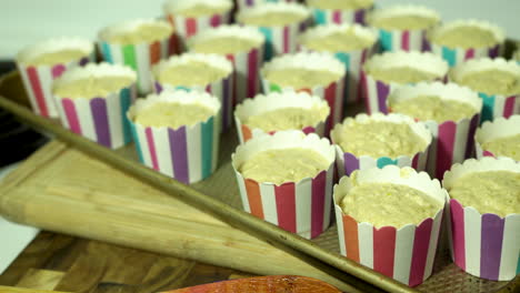 A-tray-full-of-cupcakes-ready-to-be-baked-in-the-oven