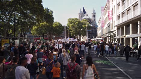 Many-protesters,of-all-ages-are-marching-through-the-streets-of-Cologne-with-posters,-signs-and-banners