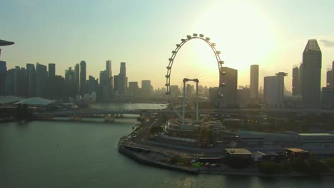 Aerial-Footage-of-Singapore-Cityscape-featuring-famous-tourist-attractions-in-Marina-Bay