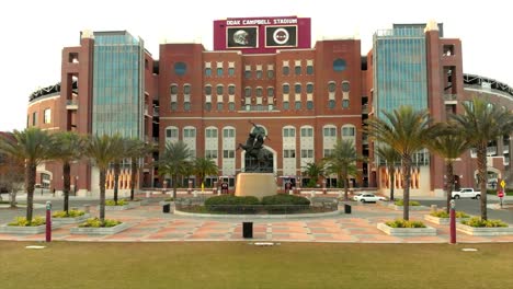 Aerial-View-of-Unconquered-Statue-at-FSU-Campbell-Stadium-During-Sunset