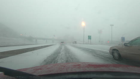 Dashboard-time-lapse-on-highway-driving-through-snow-storm