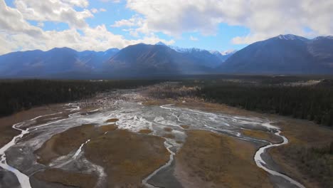 Kluane-National-Park-aerial-view-approaching-the-mountains,-British-Columbia,-Canada