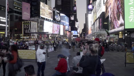 Crowd-Of-People-Walking-At-Times-Square-Amidst-Of-COVID-19-During-The-Presidential-Election-In-New-York-City,-Manhattan,-USA