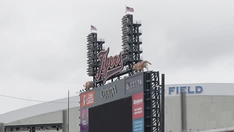 Detroit-Tigers-left-field-marquee-with-Ford-Field-visible-beyond