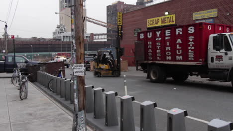 Scrap-Metal-Yard-in-Industrial-Brooklyn,-Fork-Lift-Operator