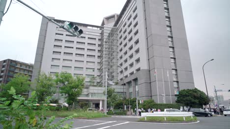 Tilt-up-Shot-Of-The-Contemporary-Exterior-Of-The-Immigration-Bureau-In-Tokyo,-Japan