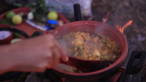 Steam-Coming-out-from-biryani-cooking-at-clay-peoduct,-Cooking-Equipment-Stock-Footage,-Kitchen-Stock-Footage,-Clay-Product-Stock-Footage