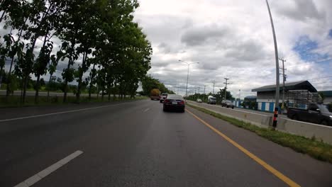 This-is-a-time-lapse-with-an-action-camera-mounted-in-front-of-the-truck,-driving-from-Pranburi-to-Hua-Hin-and-Hua-Hin-to-Bangkok-on-Phet-Kasem-Road