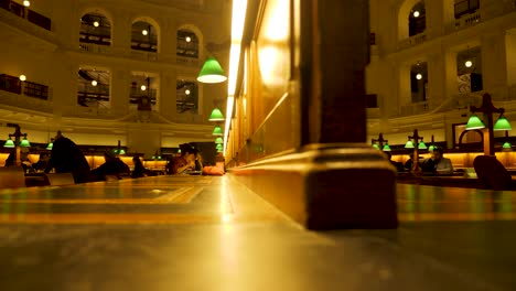 State-Library-Victoria-at-nighttime-people-studying-at-melbourne-library-Melbourne-tourism-attractions,-melbourne-library