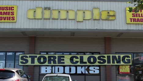 Dimple-Records-Store-Closing-Establishing-Shot-Medium-on-Sign