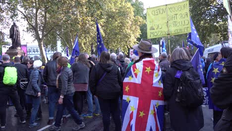 Protesters-gather-around-Parliament-Square-for-the-People's-Vote-protests-in-London,-UK