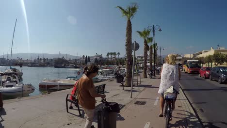 Cycling-along-the-harbour-of-the-greek-town-of-Kos