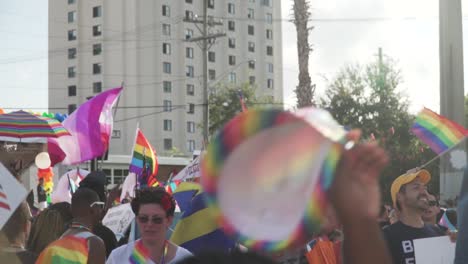 People-Marching-in-Street-at-River-City-Pride-Parade-With-Equality-and-LGBTQ-Flags-in-Jacksonville,-FL
