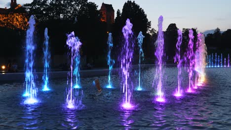 Multimedia-Fountain-Park-illuminated-at-night-in-city-of-Warsaw-in-Poland