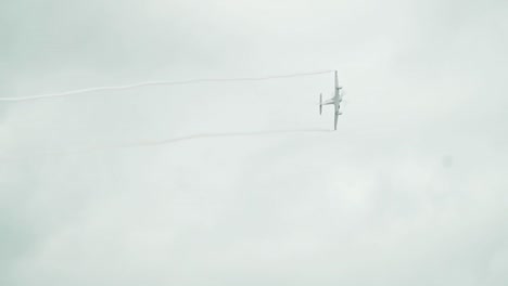 Military-aircraft-performing-wingtip-vortices-at-an-airshow