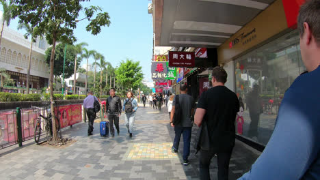 Hong-Kong-China,-circa-:-timelapse-walking-around-Tsim-Sha-Tsui-area-in-Hong-Kong-City