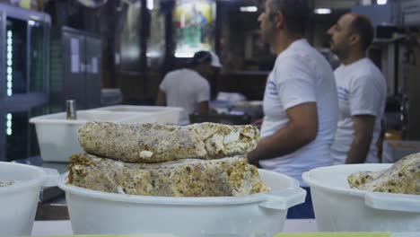 Close-up-shot-focusing-on-the-traditional-bread-that-is-made-by-the-bakers-in-Damaskus,-Syria