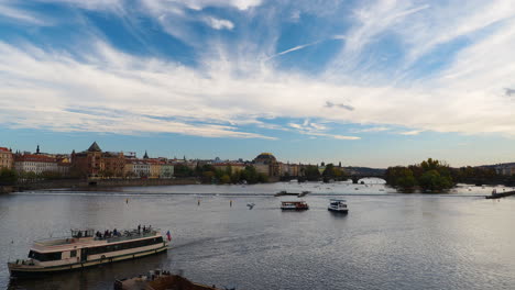 Three-tourist-boats-swim-in-the-Vltava-River-in-Prague-Czech-Republic