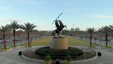 Aerial-View-of-Unconquered-Statue-at-FSU-Campbell-Stadium-During-Sunset