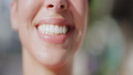 Young-Female-with-Huge-Smile-Steps-Into-Focus,-Close-Up,-Slow-Motion