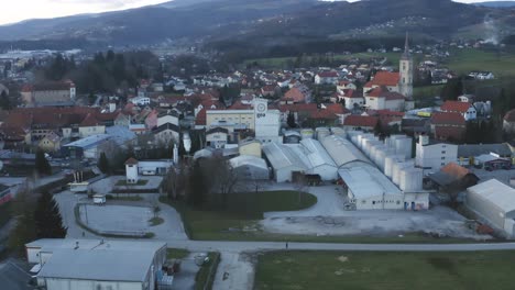 Industrial-area-in-small-town-in-Europe,-factory-in-urban-area-of-Slovenska-Bistrica,-Gea-Oil-Factory,-aerial-view-of-oil-mill-and-food-industry