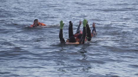 Seafarers-Practicing-Synchronized-Swimming-In-The-Patagonian-Sea-During-Nautical-Training---Slowmo