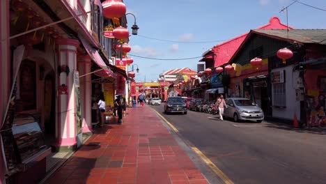 Establishing-shot-of-Malacca-Shophouses-at-street-on-sunny-day,-dolly-in