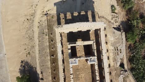 Aerial-top-down-shot-of-historic-greek-temple-ruin-architecture-in-Agrigento-during-summer