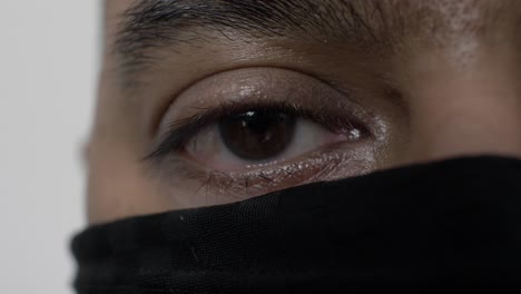 Close-Up-View-Of-Adult-UK-Asian-Male's-Left-Eye-Along-With-Balaclava
