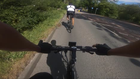 POV-Following-Cyclist-On-A4008-Oxhey-Lane-With-Car-Overtaking