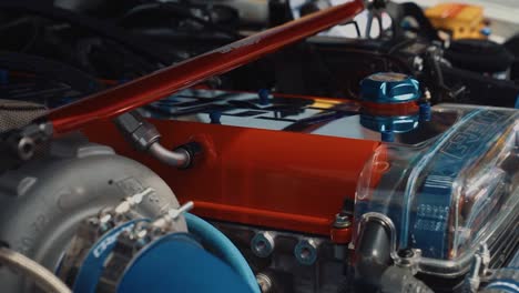 Close-Up-Arc-Shot-a-Clean-Toyota-1JZ-Engine-at-Driftcon