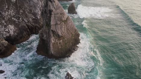 Aerial-view-of-waves-breaking-in-a-Large-Rock
