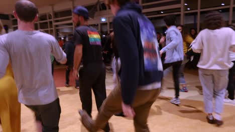 Group-Of-People-Dancing-At-The-Conference-Area-During-Youth-Conference-In-Waldorf-School,-Netherlands---full-shot