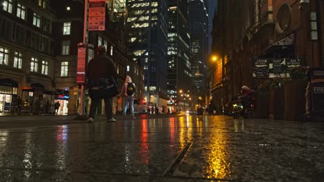 Wet-rainy-central-London-evening-from-footpath-sidewalk