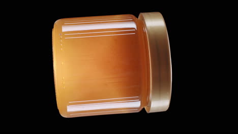Vertikale-Produktaufnahme-Eines-Honigglases-Auf-Schwarzem-Hintergrund