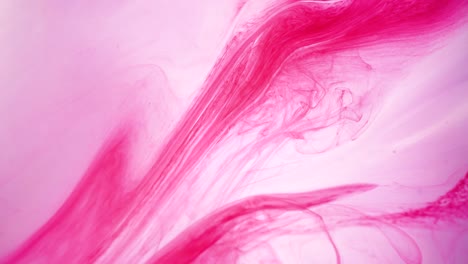 abstract-background-red,-pink-colored-paint-on-water-with-backdrop,-4k-macro-view,-interesting-colorful-background-movement