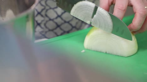 Chef-Chopping-White-Onion-On-Cutting-Board-For-Cooking