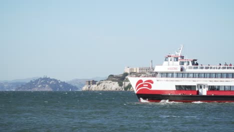 A-Tourist-Boat-Traveling-Through-the-Bay-and-Past-Alcatraz-Island-on-a-Calm-Sunny-Day-in-San-Francisco