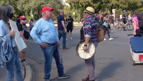 Conservative-man-and-Liberal-woman-argue-at-US-Presidential-post-election-protest-in-Austin,-TX----4K