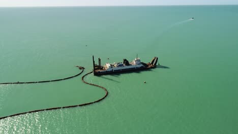 "Anna-Maria-Island,-FL---USA---11-14-2020:-Aerial-video-clip-of-a-ship-working-a-few-miles-offshore-near-Anna-Maria-Island