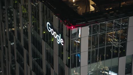 Google-Headquarters-In-Shibuya,-Tokyo-At-Night---Futuristic-Building-Exterior---high-angle-shot,-real-time