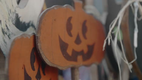 Wooden-Jack-O-Lantern-craft-decorations,-Slow-Motion