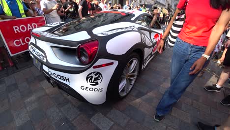 Close-up-shot-of-pimped-Ferrari-Car-presenting-on-Automobile-Gumball-3000-Event-in-London