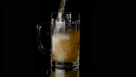 Pouring-beer-in-a-mug,-but-some-drops-are-going-wrong