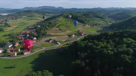 Early-hours-in-the-morning,-rural-town-below-in-the-distance