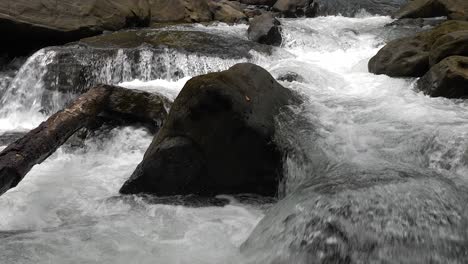 Water-rapids-in-the-river-gushing-down-at-high-speed