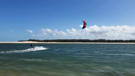 Man-kite-surfs-at-Caloundra-on-a-windy-sunny-day